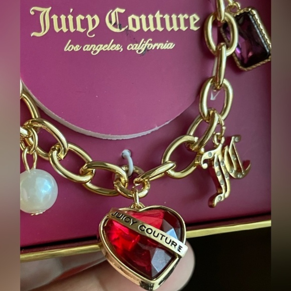 Juicy Couture Bracelet,Juicy Couture Gold Bracelet with Heart and Pearl Charms.